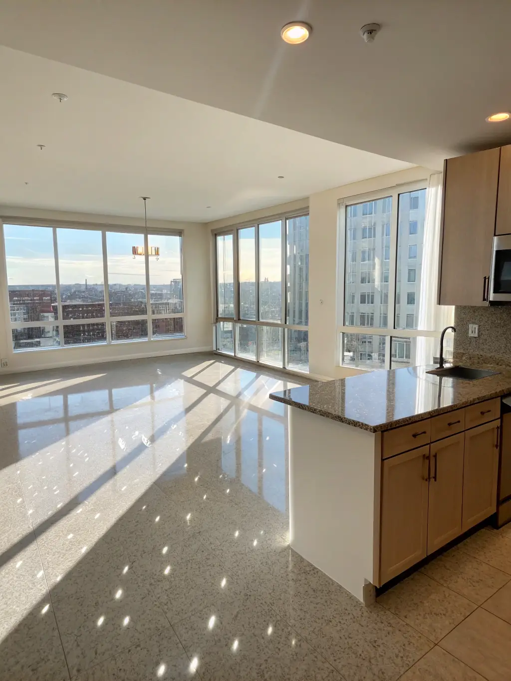 An image depicting an empty apartment after a move-out cleaning, showcasing the cleanliness and readiness of the space for new tenants, reflecting Cleanup Station LLC's commitment to quality.